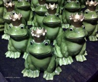 A flock of frog prince statues for sale during a festival in Piazza Walther, Bolzano